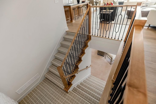 16735 S Hall St, Olathe, KS 66062 - stairway with hardwood / wood-style floors