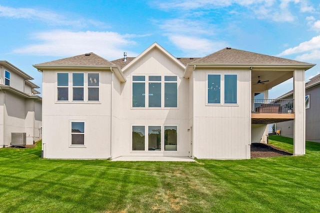 16735 S Hall St, Olathe, KS 66062 - rear view of house with central AC unit, a yard, a patio area, and ceiling fan