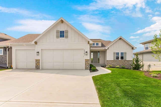 16735 S Hall St, Olathe, KS 66062 - view of front of home with a garage and a front yard