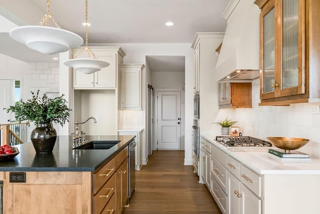 16735 S Hall St, Olathe, KS 66062 - kitchen featuring pendant lighting, sink, premium range hood, stainless steel appliances, and white cabinets
