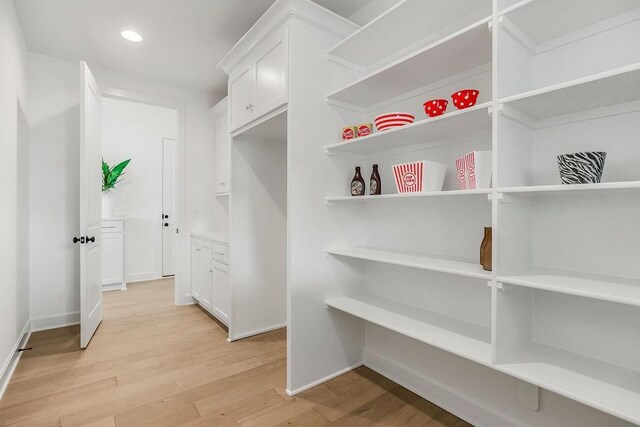 16743 S Hall St, Olathe, KS 66062 - spacious closet featuring light wood finished floors