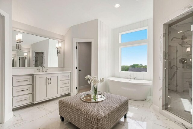 16743 S Hall St, Olathe, KS 66062 - full bath featuring a stall shower, a freestanding tub, marble finish floor, and vanity