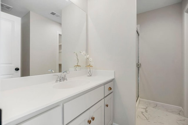 16743 S Hall St, Olathe, KS 66062 - bathroom featuring a shower stall, vanity, visible vents, and marble finish floor
