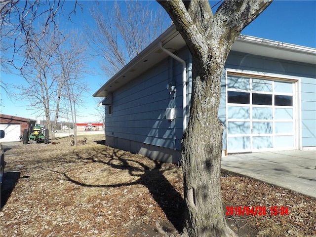 view of home's exterior with a garage