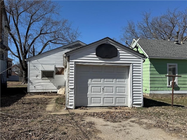 garage featuring driveway