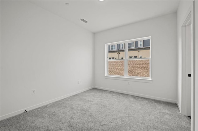 unfurnished room featuring carpet floors