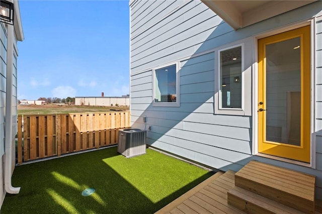 view of yard featuring central AC unit