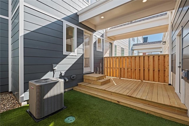 wooden deck with central AC unit