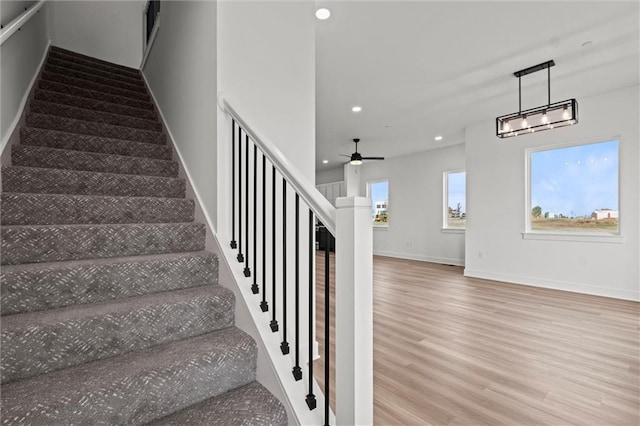 444 SW Brummel Rd, Lees Summit, MO 64081 - stairs featuring recessed lighting, wood finished floors, baseboards, and a ceiling fan