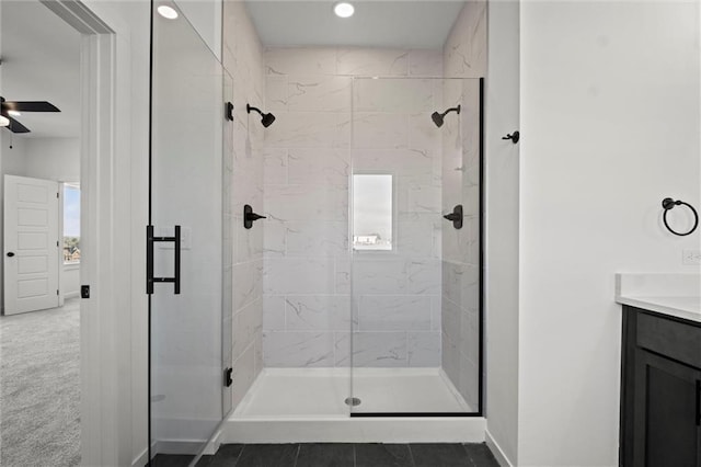 444 SW Brummel Rd, Lees Summit, MO 64081 - bathroom featuring a stall shower, vanity, ceiling fan, baseboards, and recessed lighting