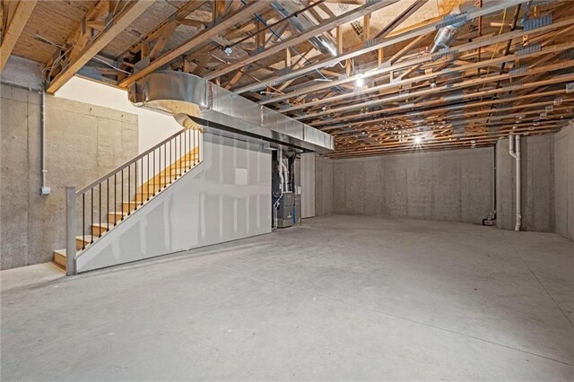 448 SW Brummel Rd, Lees Summit, MO 64081 - unfinished basement with heating unit and stairs