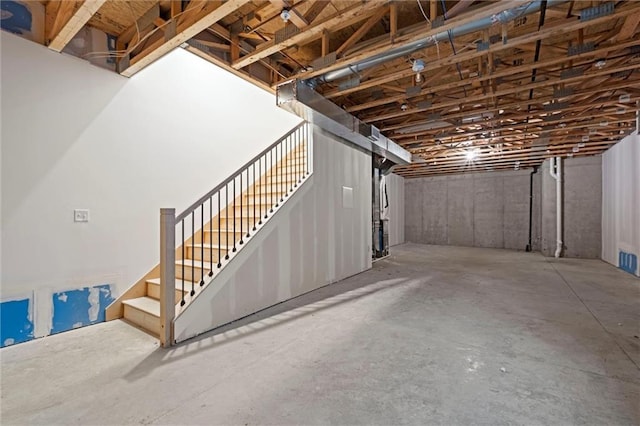 452 SW Brummel Rd, Lees Summit, MO 64081 - unfinished below grade area featuring stairs