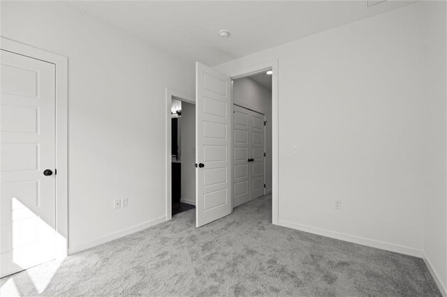 452 SW Brummel Rd, Lees Summit, MO 64081 - unfurnished bedroom featuring carpet and baseboards