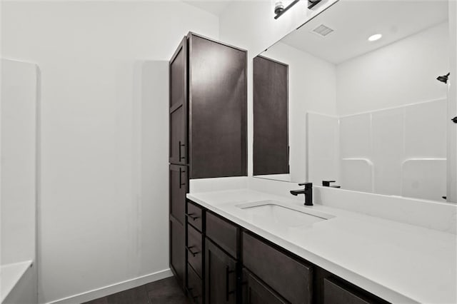 454 SW Brummel Rd, Lees Summit, MO 64081 - bathroom with vanity and baseboards