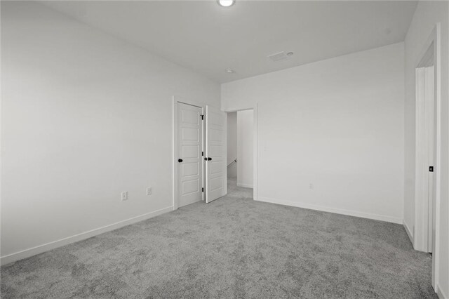 456 SW Brummel Rd, Lees Summit, MO 64081 - unfurnished bedroom with carpet and baseboards