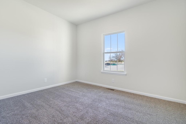 empty room featuring carpet