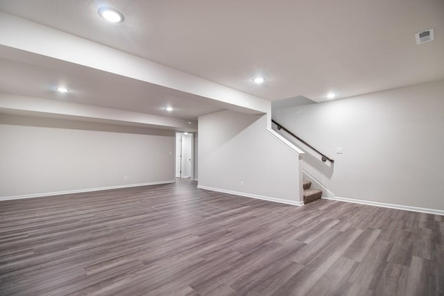 basement featuring hardwood / wood-style flooring