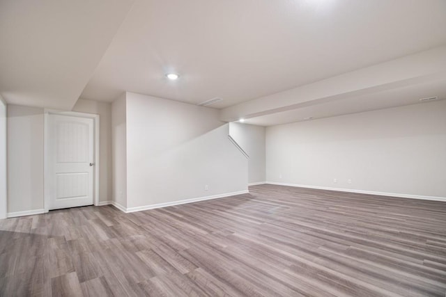 bonus room featuring light hardwood / wood-style floors