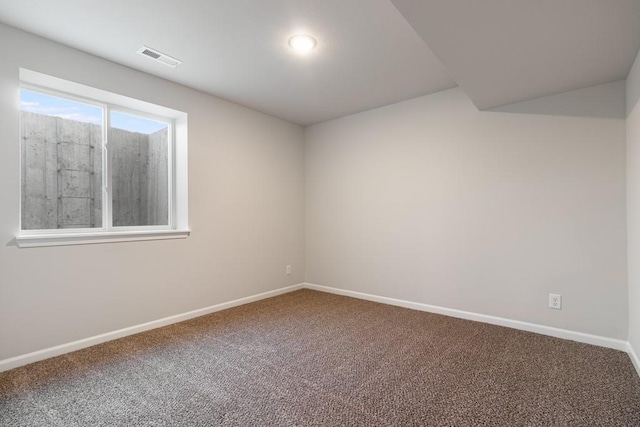 spare room featuring carpet flooring