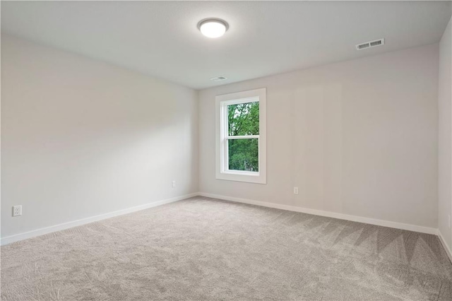 empty room featuring carpet flooring