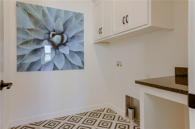 washroom featuring light tile floors