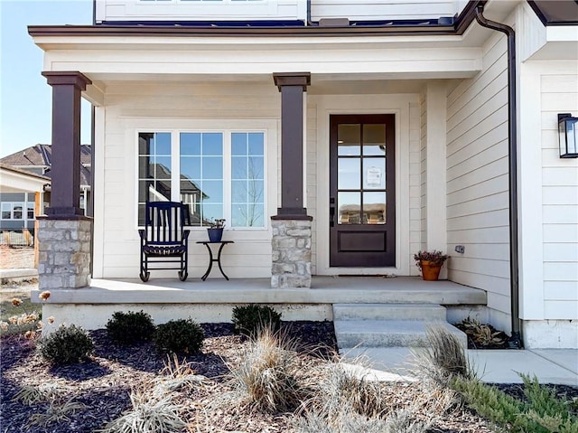 property entrance with covered porch