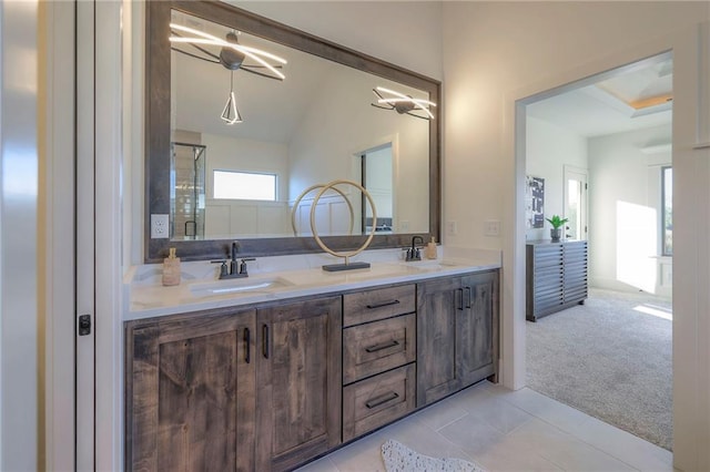 bathroom featuring tile patterned floors and vanity