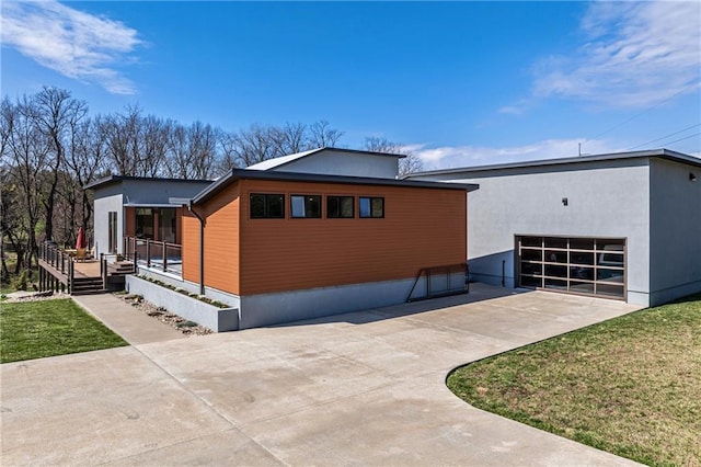 view of side of property with a yard