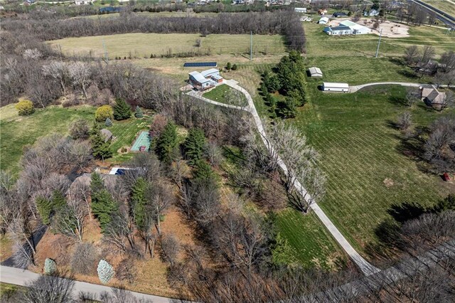 birds eye view of property featuring a rural view