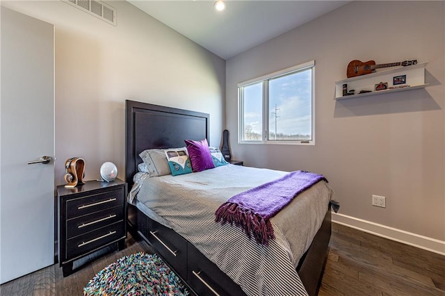 bedroom featuring dark wood-type flooring