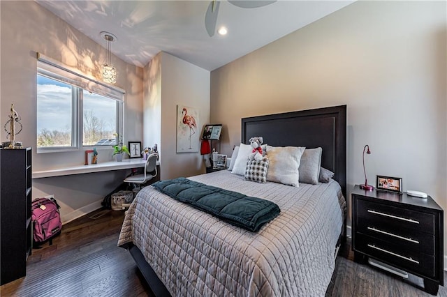 bedroom featuring dark hardwood / wood-style floors and ceiling fan