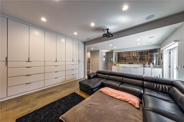 living room featuring concrete floors