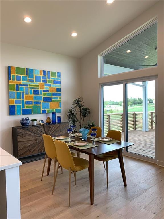 dining area with light hardwood / wood-style floors