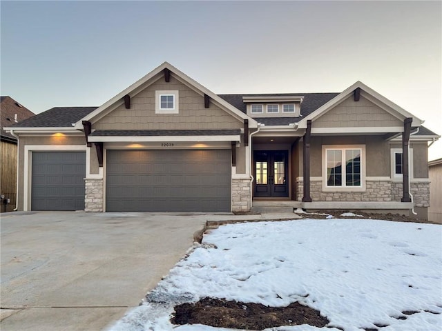 craftsman inspired home with french doors and a garage