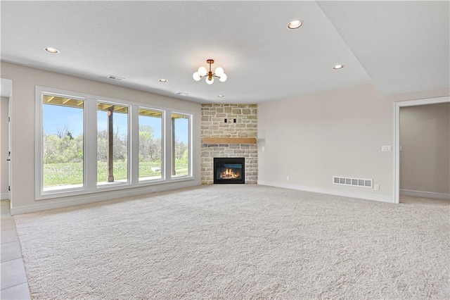 unfurnished living room featuring recessed lighting, visible vents, baseboards, and an inviting chandelier