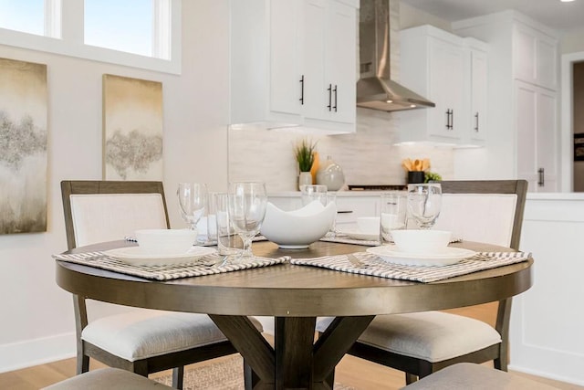 dining room featuring light hardwood / wood-style flooring