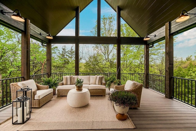 sunroom / solarium with vaulted ceiling