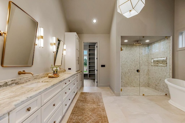 bathroom with lofted ceiling, vanity, independent shower and bath, and tile patterned floors