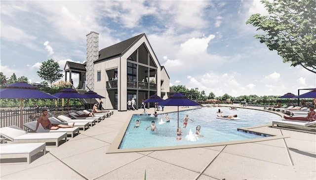 view of swimming pool featuring a patio area