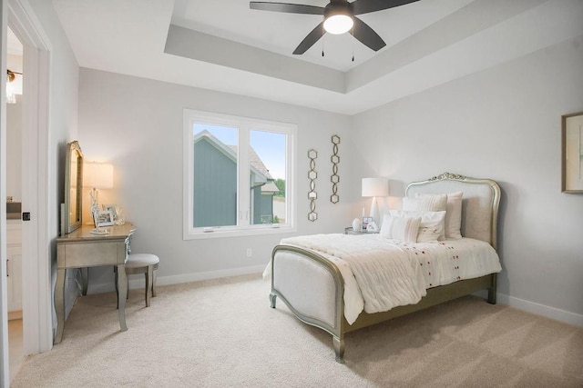 8009 Millridge St, Shawnee, KS 66220 - bedroom with light carpet, a raised ceiling, and ceiling fan