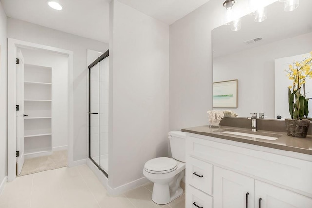 8009 Millridge St, Shawnee, KS 66220 - full bath featuring a shower stall, vanity, and tile patterned flooring