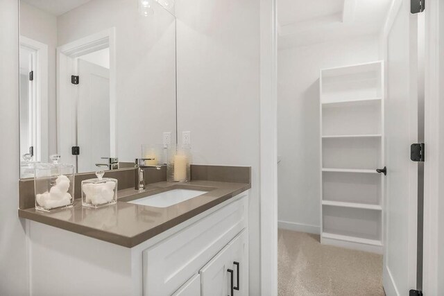 8009 Millridge St, Shawnee, KS 66220 - bathroom featuring vanity and baseboards