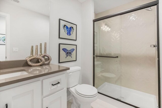 8009 Millridge St, Shawnee, KS 66220 - bathroom with vanity and a shower stall