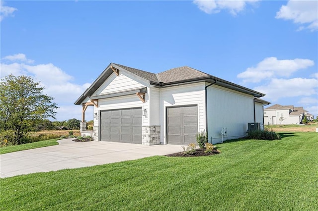 view of home's exterior featuring central air condition unit and a lawn