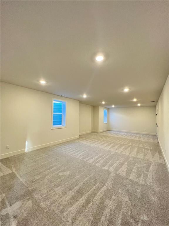 basement with light carpet