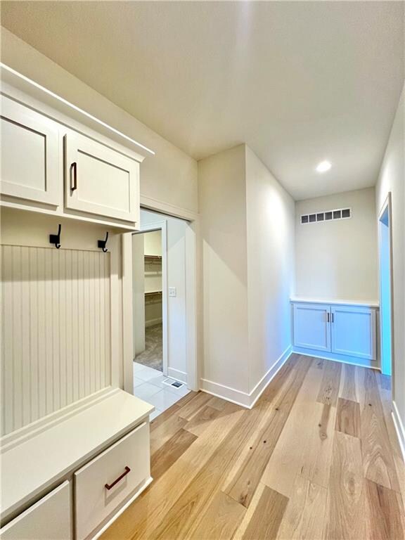 mudroom featuring light hardwood / wood-style flooring