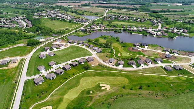 birds eye view of property featuring a water view and golf course view