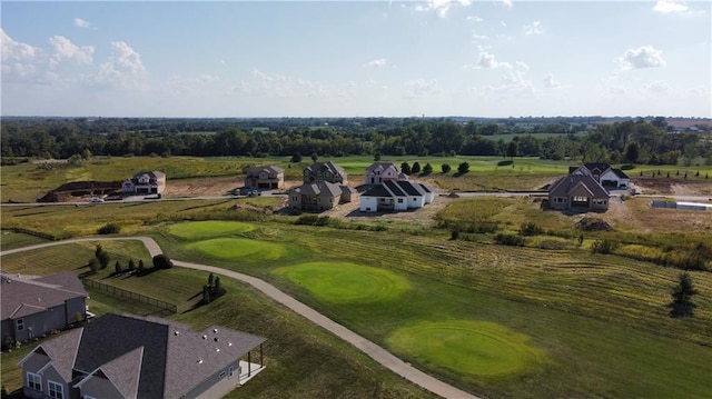 bird's eye view with view of golf course