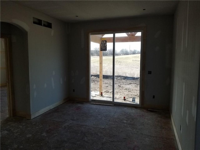 empty room with arched walkways