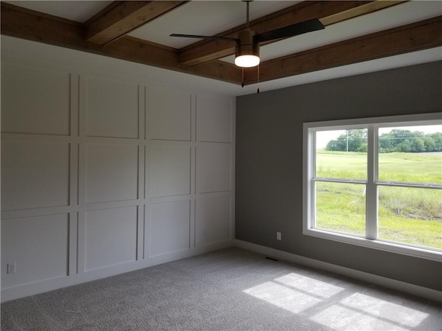 4576 Aspen Dr, Basehor, KS 66007 - unfurnished bedroom featuring beamed ceiling and light carpet
